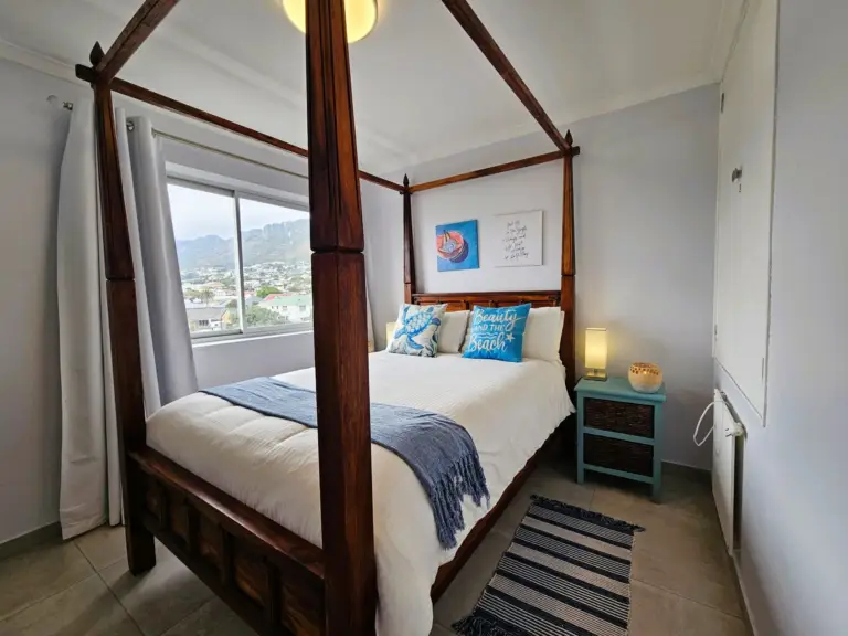4 la corniche gordons bay 21 guest bedroom with poster bed 768x576