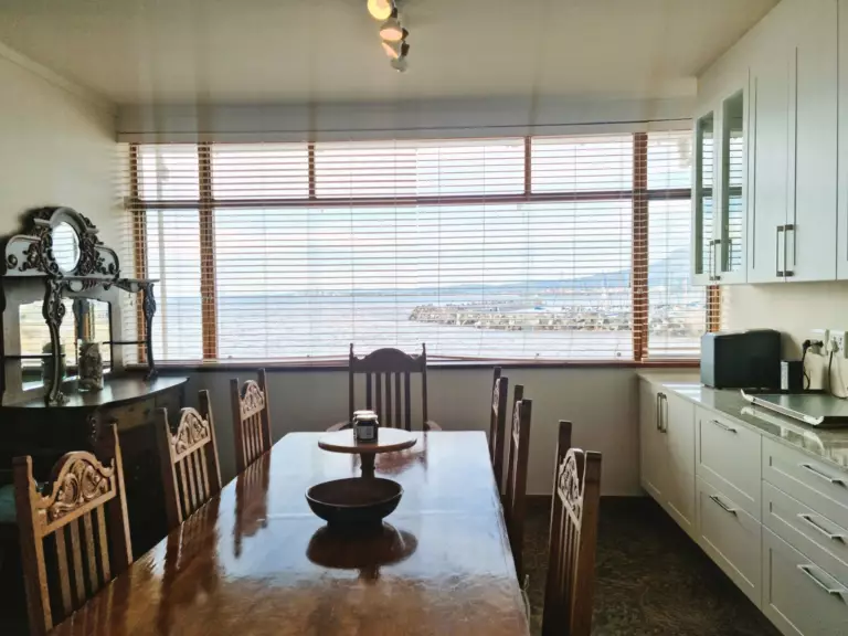 bikini beach holiday home gordons bay 24 farm style kitchen with beach view 768x576