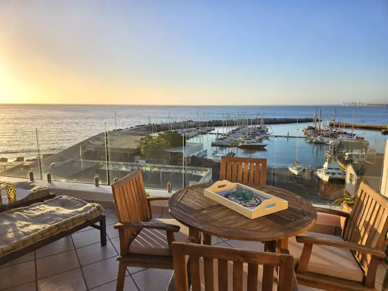 Outdoor dining with sunset sea view Outdoor dining with sunset sea view
